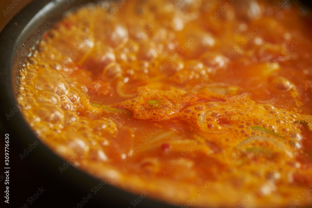 Korean spicy tofu stew in pot Korean spicy tofu stew in pot