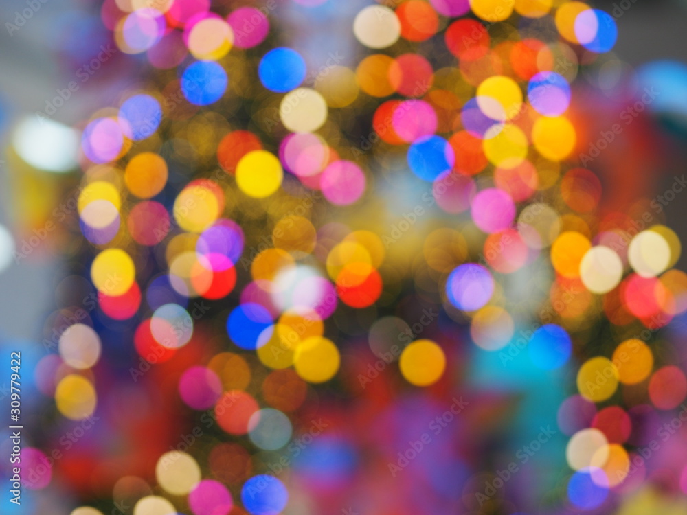 bokeh from shooting table tennis lights colorful lighting, blue red green orange black white yellow color blurred of background,Merry Christmas Day