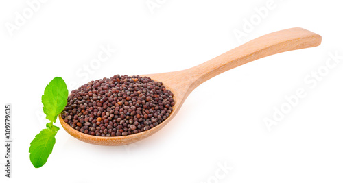 Brown mustard seeds on white background