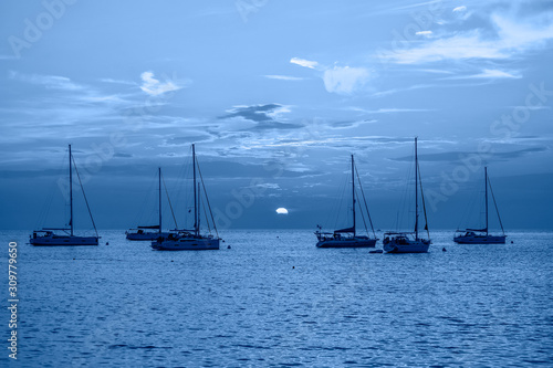 Evening view on Yachts, fishing boats and the Adriatic sunset sea, Rovinj, Croatia. © esvetleishaya