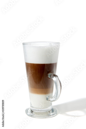 a glass of latte macchiato coffee