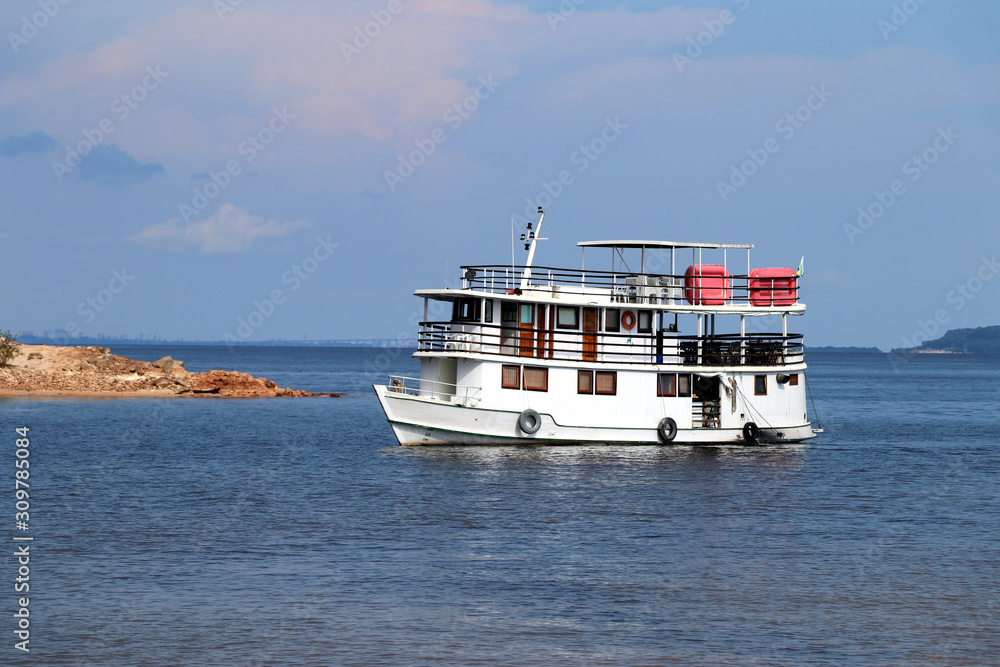 Expedition boat on the Amazon River - Amazon, Brazil Expedition boat on the Amazon River - Amazon, Brazil