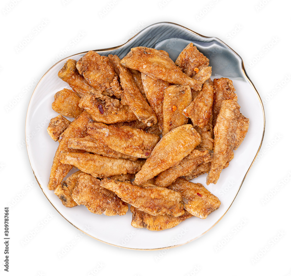 Small Fried Fish Crispy with dried chilli on white background, top view Small Fried Fish Crispy with dried chilli on white background, top view