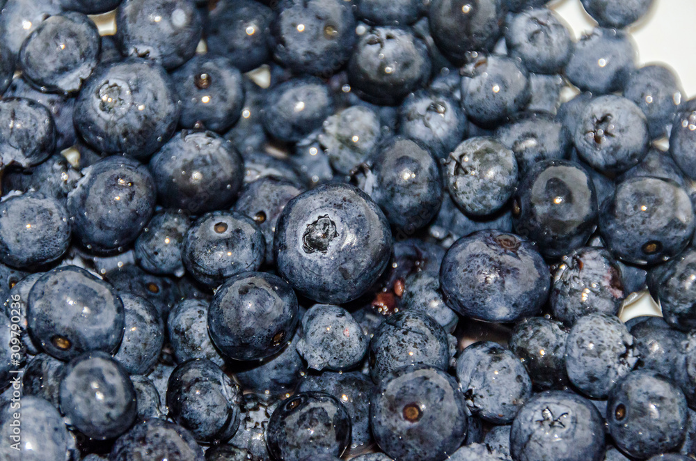 Bunch of blueberries close up, background texture. Bunch of blueberries close up, background texture.