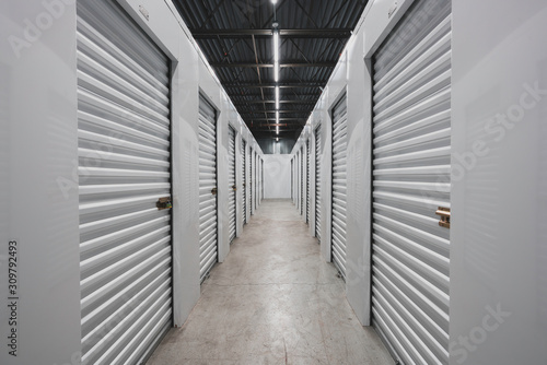 Self storage facility, metal doors with locks. Moving, storage concept.