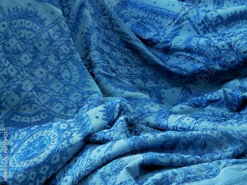 Blue indian arab textile tribal pattern closeup photo