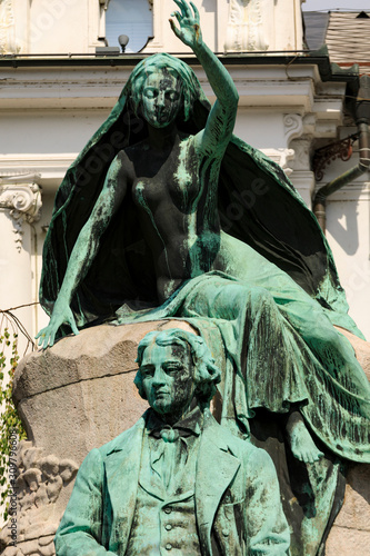 Prešeren Monument, a bronze statue of the Slovene national poet France Prešeren, in Ljubljana, the capital of Slovenia. It is among the best-known Slovenian monuments. The statue is a design by Ivan Z