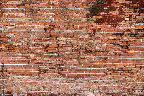 Red old brick wall texture loft grunge background. Italian masonry