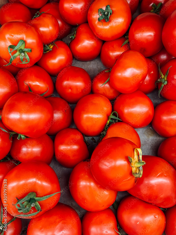 lots of ripe red tomato for eating like a background lots of ripe red tomato for eating like a background