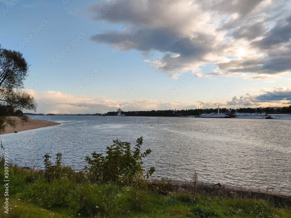 Autumn clouds over the great river Volga