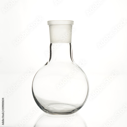 The glass bulb. Spherical flask. Chemical flask. Chemical vessels. Glassware. Spherical flask with a flat bottom. Polished neck.