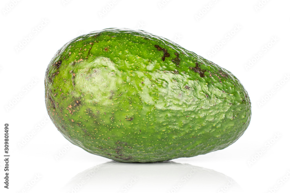 One whole fresh green avocado isolated on white background One whole fresh green avocado isolated on white background