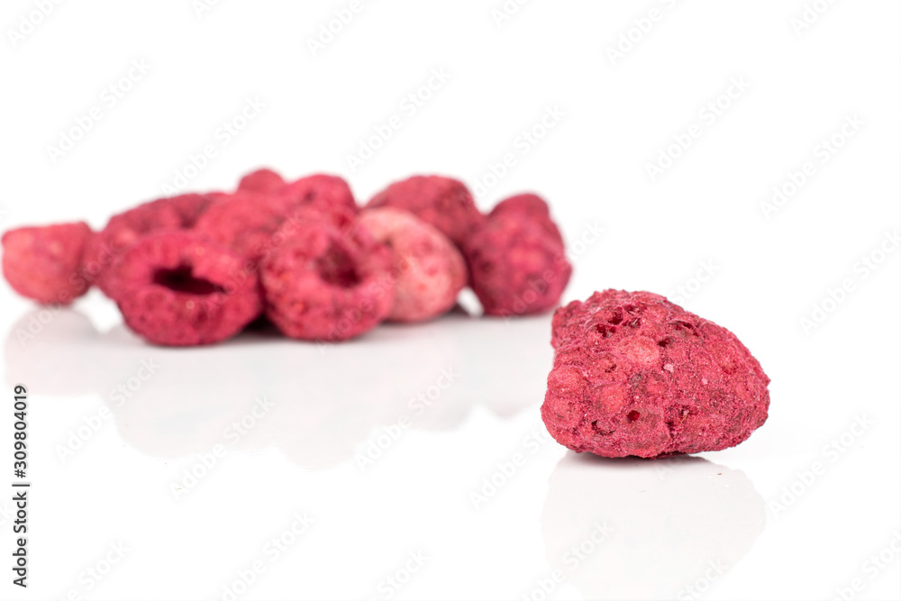 Lot of whole dried raspberry front focus isolated on white background Lot of whole dried raspberry front focus isolated on white background