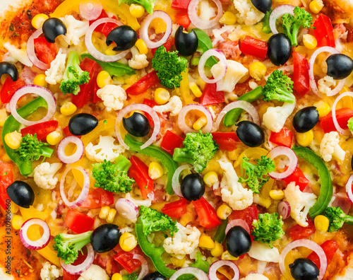 vegetarian pizza texture. raw ingredients tomato pepper onion corn broccoli cauliflower