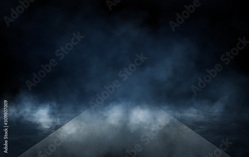 Empty dark room, brick wall and concrete floor. Empty building scene. Blue neon light. Dark empty scene, blue neon searchlight light, wet asphalt, smoke, night view, rays.