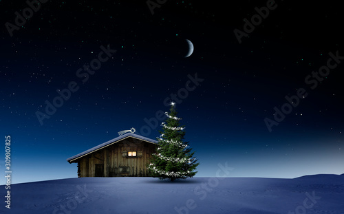 Weihnachtlich beleuchtete Hütte in Kalter Winternacht mit Sternenhimmel und C...
