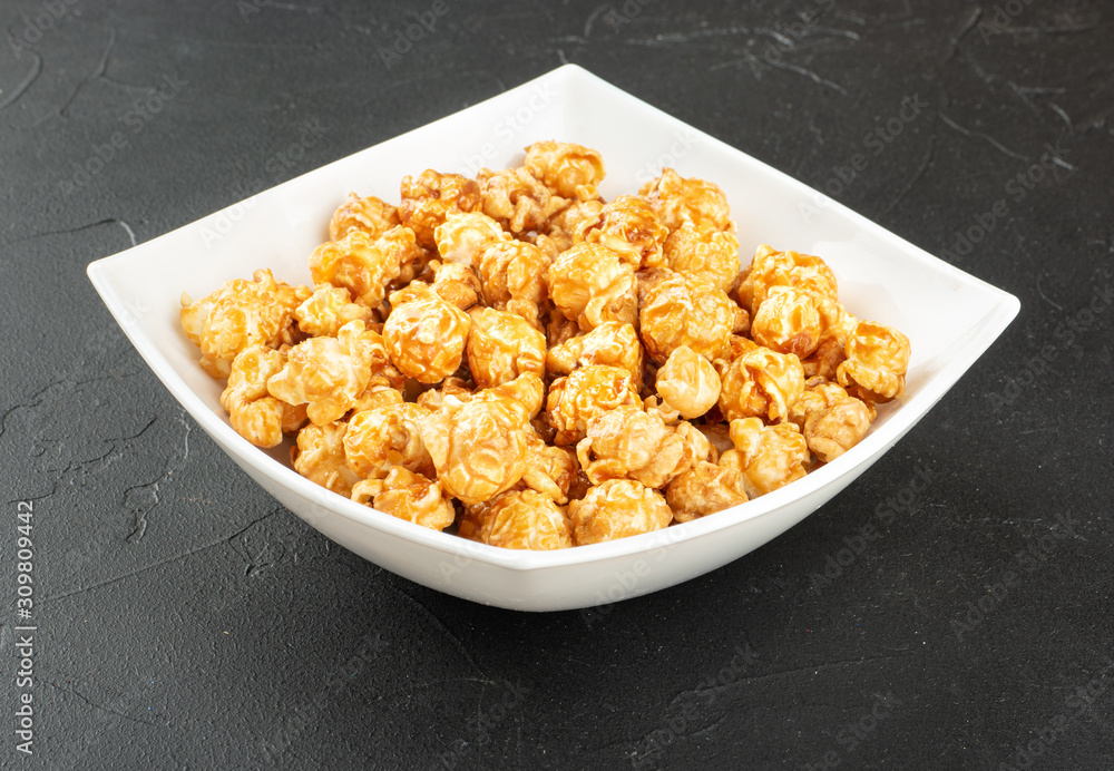 Caramel popcorn in bowl Caramel popcorn in bowl