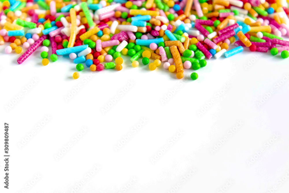 Sugar sprinkles dots on white background, decoration for cake and bakery for happy easter. Isolated on white. Sugar sprinkles dots on white background, decoration for cake and bakery for happy easter. Isolated on white.