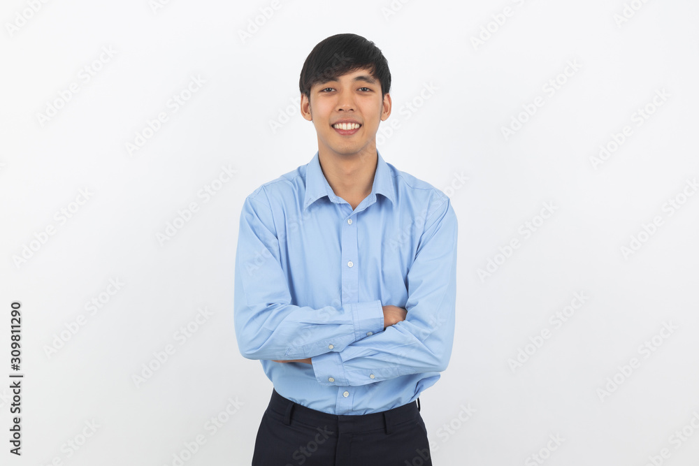 Young handsome asian business man looking to camera with arms crossed isolated on white background. Young handsome asian business man looking to camera with arms crossed isolated on white background.
