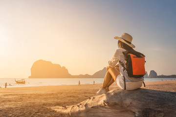 Happy traveler woman joy relaxing on summer vacation at sunset Pak Meng beach, Leisure outdoor lifestyle tourist travel Trang Thailand fun beach, Tourism beautiful destination place Asia holiday trips