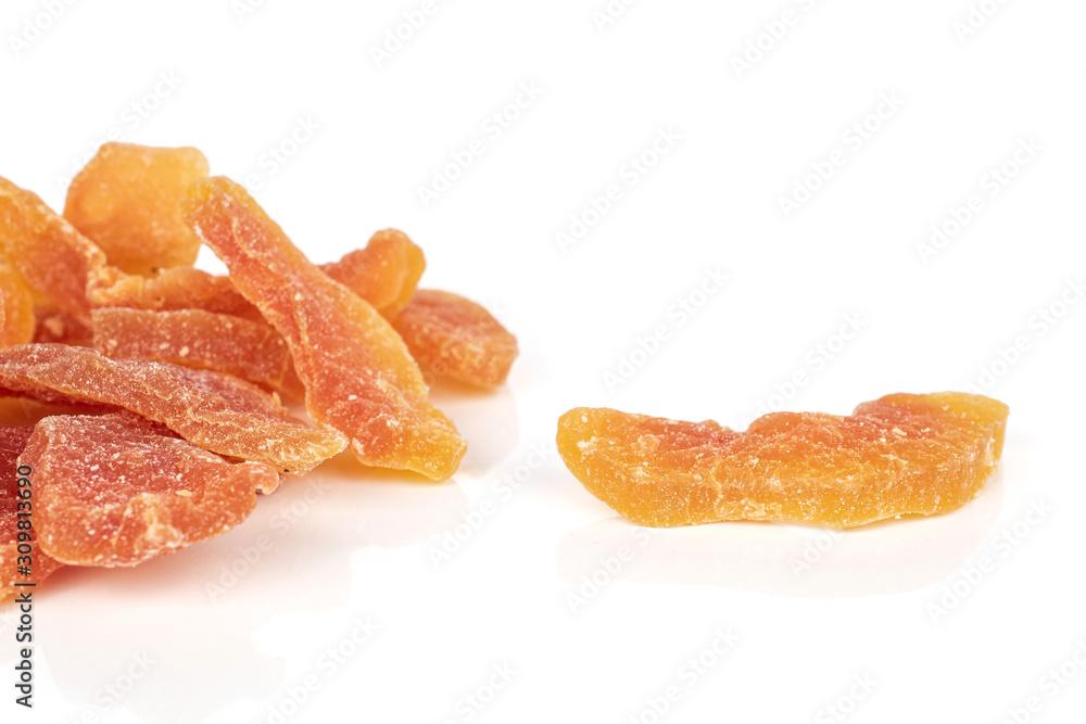 Lot of whole dried orange papaya piece isolated on white background