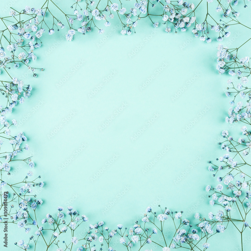 Beautiful flower frame of blue gypsophila flowers. Flat lay, top view. Floral pattern. Beautiful flower frame of blue gypsophila flowers. Flat lay, top view. Floral pattern.