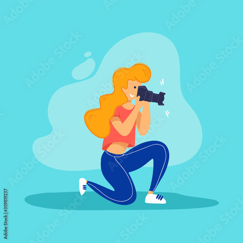 Woman photographer taking photo with digital camera