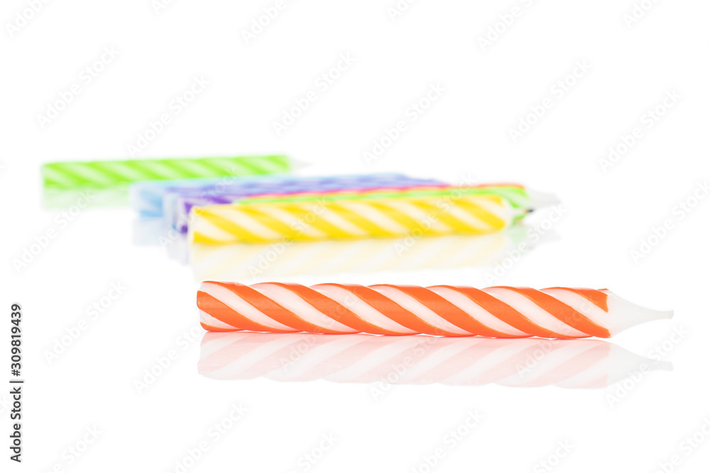 Lot of whole birthday cake candle front focus isolated on white background Lot of whole birthday cake candle front focus isolated on white background