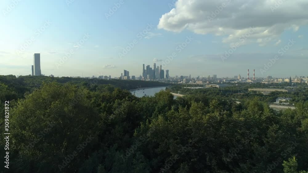 Aerial shot of Sparrow Hills and skyscrapers of Moscow International Business Centre in the distance Aerial shot of Sparrow Hills and skyscrapers of Moscow International Business Centre in the distance