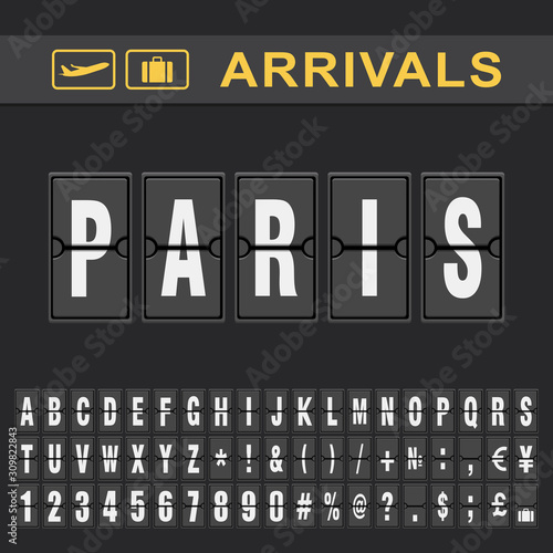 Analog airport flip board displays flight info of arrivals destination in Paris