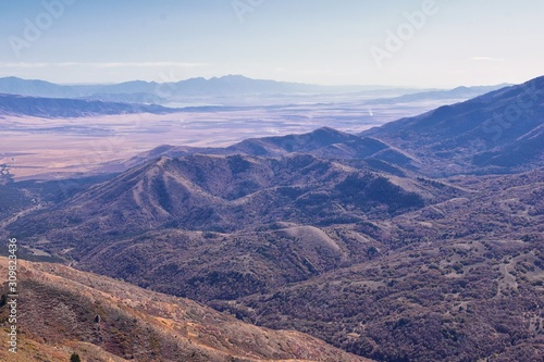 Wasatch Front Rocky Mountain landscapes from Oquirrh range looking at Utah Lake during fall. Panorama views near Provo, Timpanogos, Lone and Twin Peaks. Salt Lake City. United States. © Jeremy