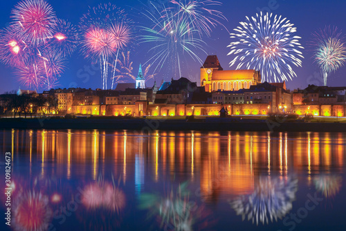 New year celebrate fireworks over Old Town of Torun. Poland, Europe