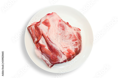 Raw meat in plate on white background