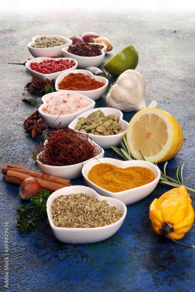 Spices and herbs on table. Food and cuisine ingredients with oil and vinegar