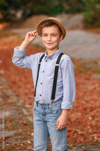 Cute fashionable boy in aut...