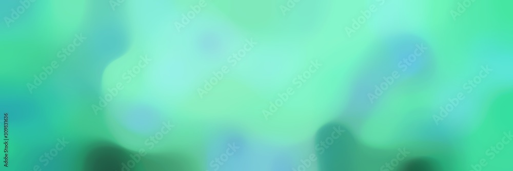 blurred iridescent horizontal background with medium aqua marine, light sea green and sea green colors and space for text or image blurred iridescent horizontal background with medium aqua marine, light sea green and sea green colors and space for text or image