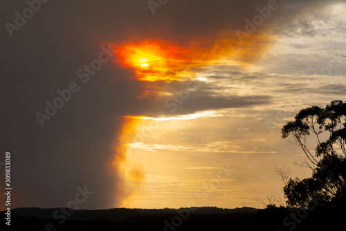 Bushfire smoke across a valley in The Blue Mountains at sunset © Phillip