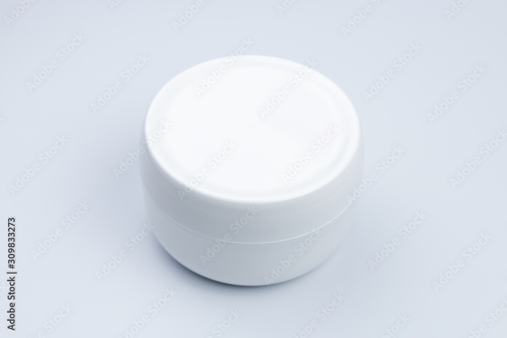 close up of beauty cosmetic container on white background close up of beauty cosmetic container on white background