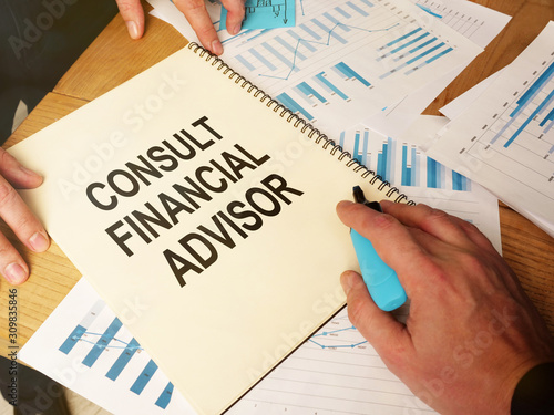 Text sign showing hand written words consult financial advisor