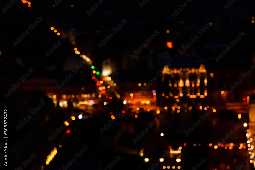 Abstract and blurred background of the big city lights. Bokeh concept