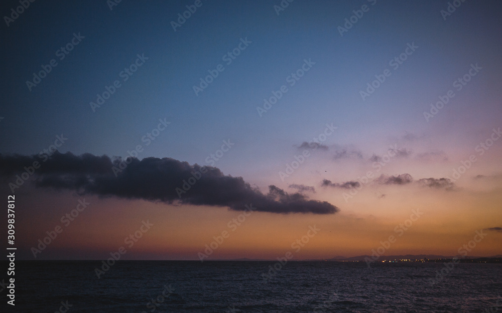 Beautiful sunset on Mediterranean sea, Cote d Azur, France. Epic twilight landscape. Traveling.
