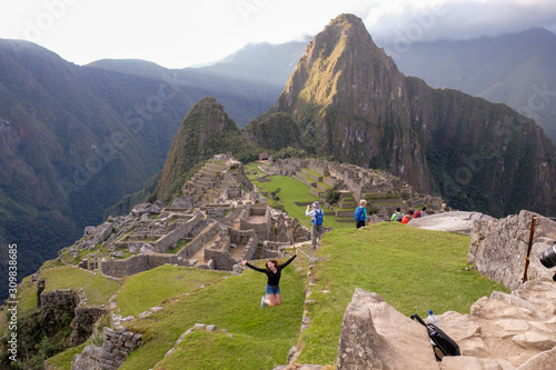 Jackie jumping for joy at Machu Picchu