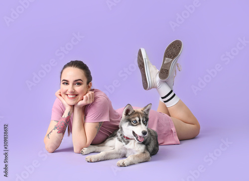 Cute woman with funny husky...