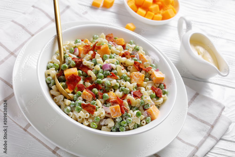 elbow macaroni salad with green peas, close-up elbow macaroni salad with green peas, close-up