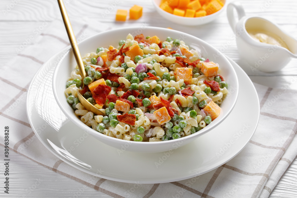 elbow macaroni salad with green peas, close-up elbow macaroni salad with green peas, close-up