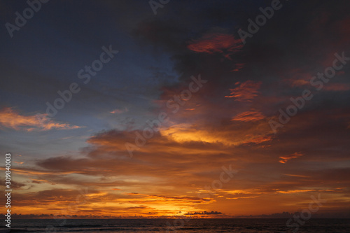 Beautiful sunset on the ocean. Color of the sky