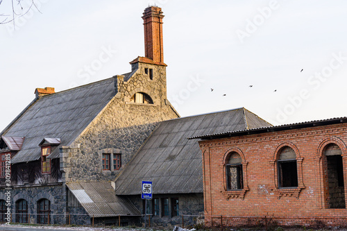 Building of the old water mill in Nemirov, Ukraine photo