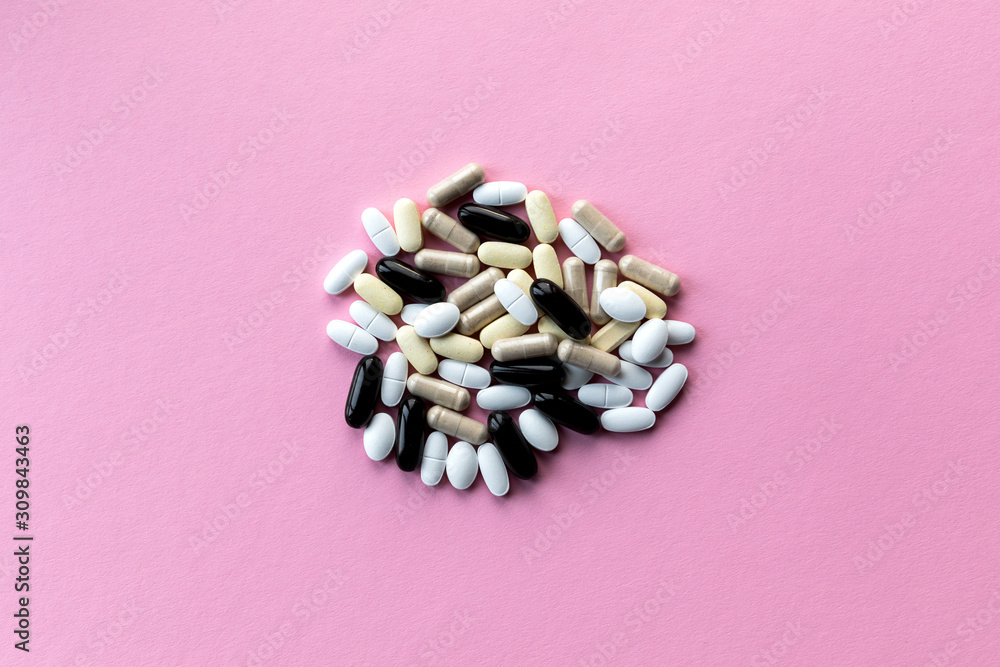 Concept: the intake of dietary supplements and vitamins without a doctor's prescription in large quantities - Concept: the intake of dietary supplements and vitamins without a doctor's prescription in large quantities -