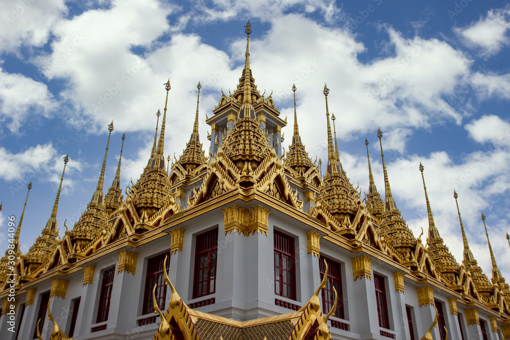 Fototapeta premium Roof style of Thai temple Bangkok, Thailand. Loha Prasat at Wat Ratchanatdaram
