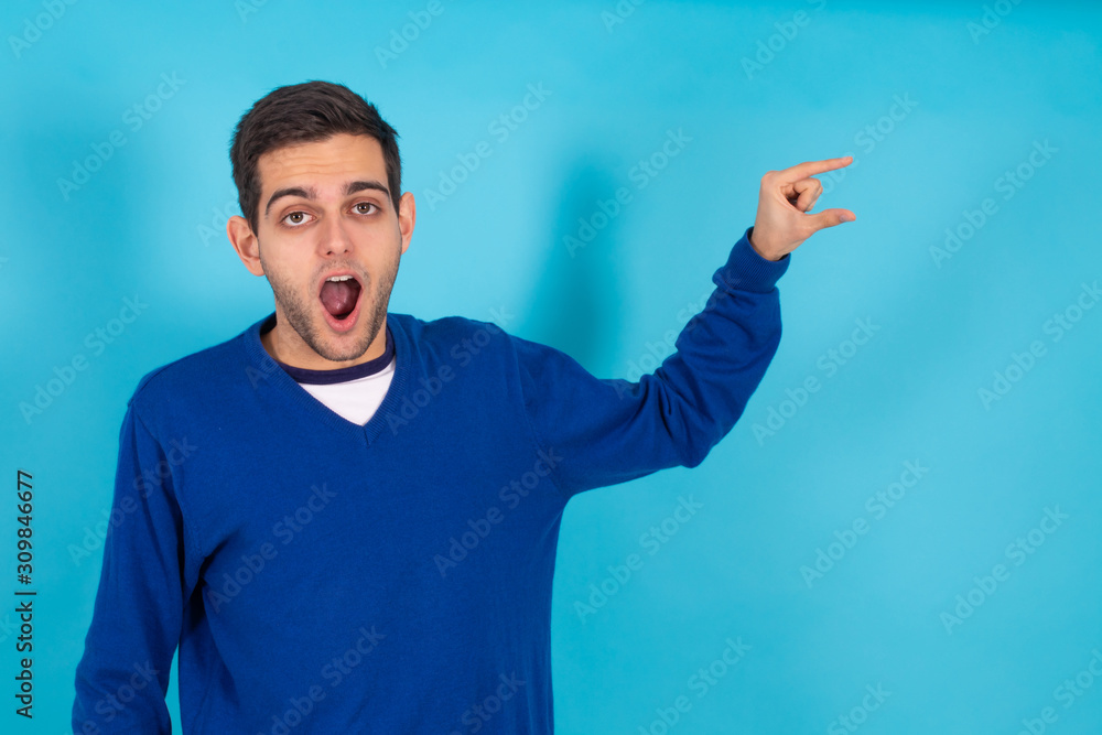 young man isolated on color background